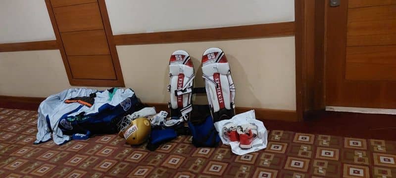 Cricket kit , professional kovai TNPL team, outside their hotel room door