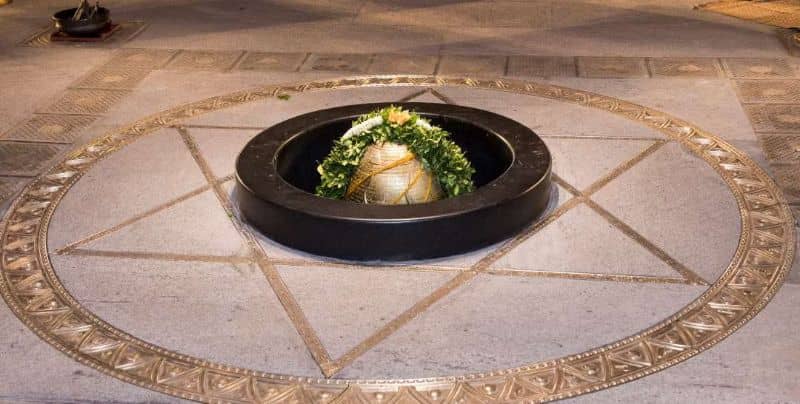 Yogeshwar Linga close up shot. With metal and stone mixed work around it.