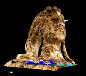 A close up shot of Adiyogi with laser projections during the light show